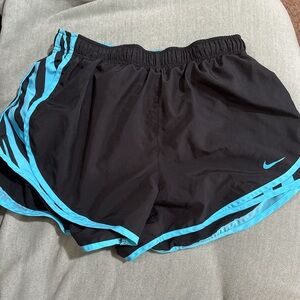 Nike Black and Blue Athletic Shorts with Curved Hem